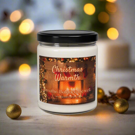 Christmas Warth candle on table with holiday background - wellness by heart