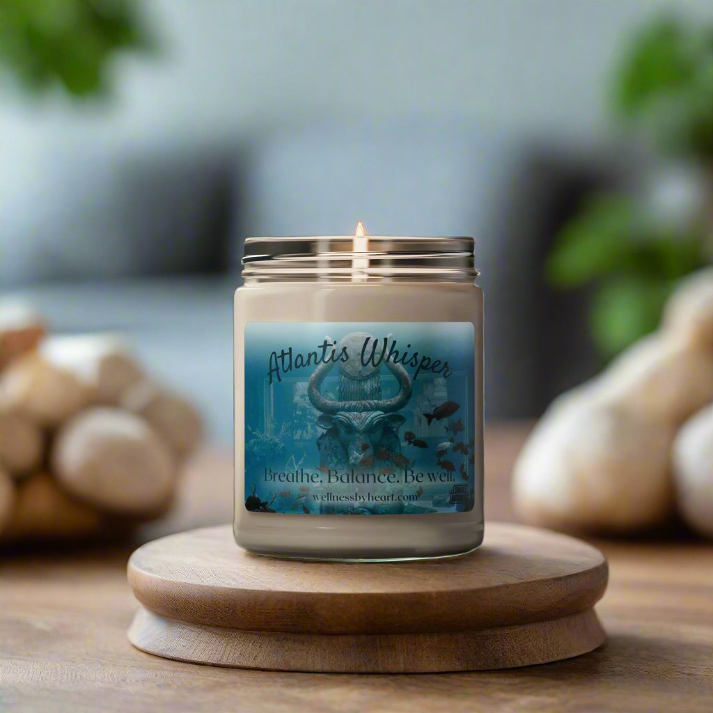 Atlantis Whisper essential oil soy candle long burning - wellness by heart - Candle lit in dark room with lid leaning on the side