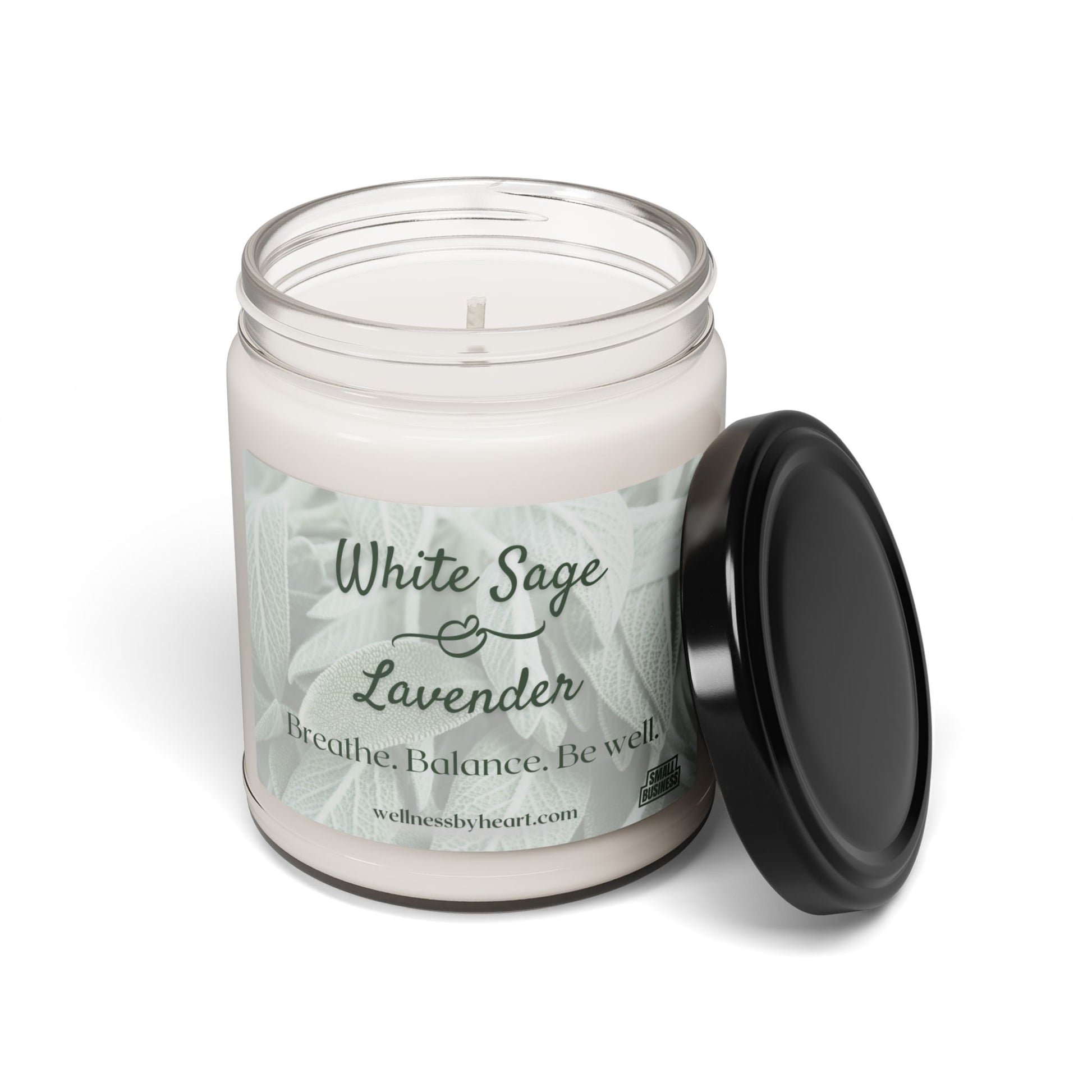 White Sage and Lavender Essential Oil Soy Candle white background with lid removed and leaning on the side of the candle's jar