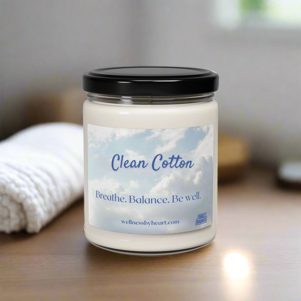 The Clean Cotton Essential Oil Soy Candle's scent profile includes cotton blossom, Lemon on the top with complementing linen and powder, subtle sandalwood and violet base.